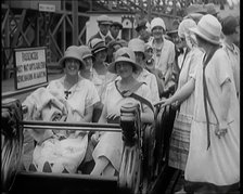 A Large Group of Female Civilians Enjoying  a Roller Coaster Ride, 1926. Creator: British Pathe Ltd.