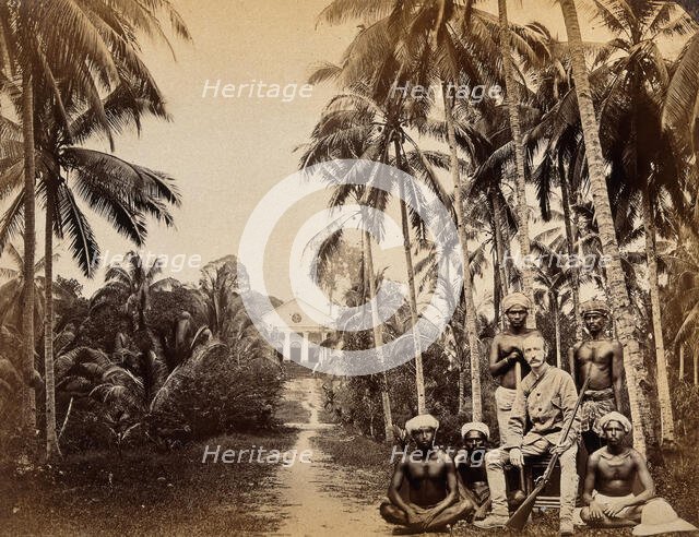 Singapore: a western hunter and native Malays with a background view of the Roman Catholic..., 1880. Creator: John Edmund Taylor.