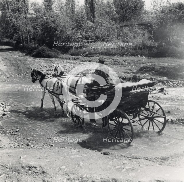 Tourists travelling by horse-drawn carriage, Bosnia and Hercegovina, Yugoslavia, 1939. Artist: Unknown