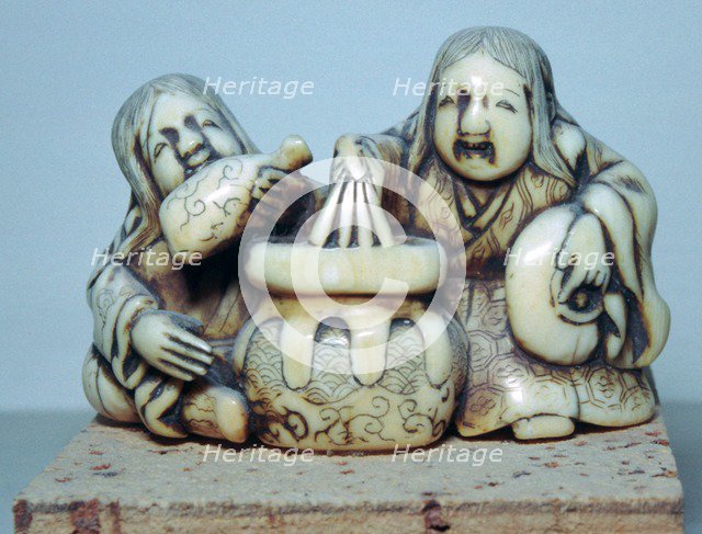 Japanese Netsuke of two drunkards, 18th century.  Artist: Gyoku-un