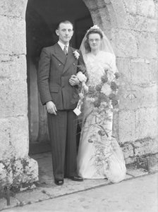 Bride and groom, c1935. Creator: Kirk & Sons of Cowes.