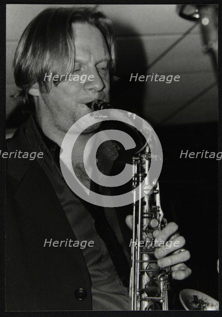 Alto saxophonist Matt Wates playing at The Fairway, Welwyn Garden City, Hertfordshire, 2003. Artist: Denis Williams