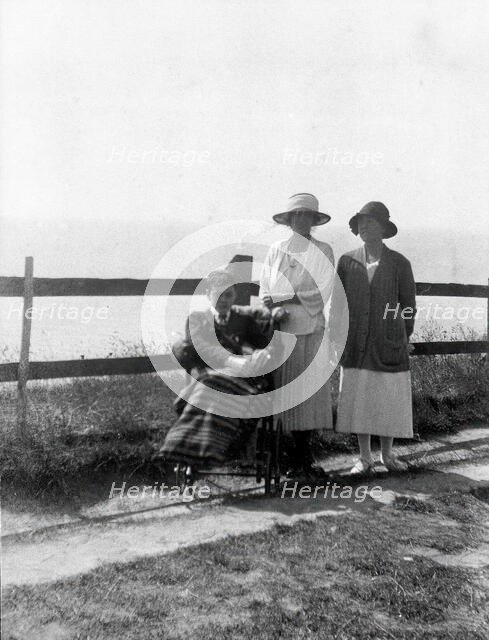 A physically disabled boy sitting in a wheelchair,  c1910/1925. Creator: Unknown.