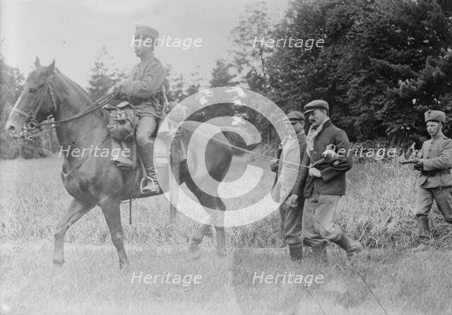 Belgian Franctireurs, prisoners of German Hussars, between 1914 and c1915. Creator: Bain News Service.