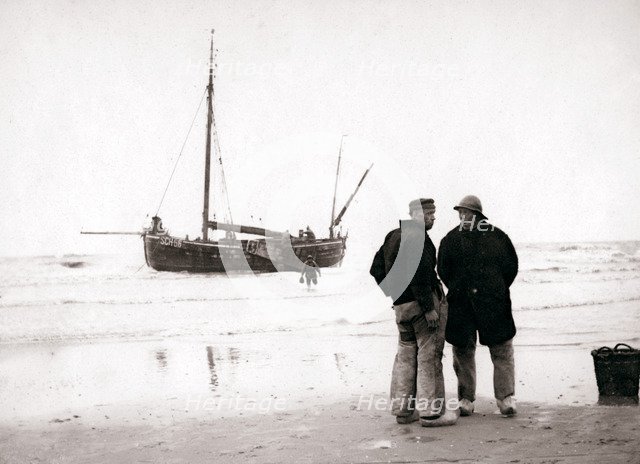 Men on the shore, Scheveningen, Netherlands, 1898.Artist: James Batkin
