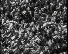 Crowd Watching the Silver Jubilee Parade of George V, His Majesty The King, 1936. Creator: British Pathe Ltd.