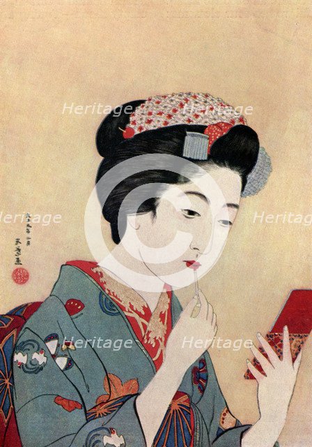 A Japanese woman using a beni brush to paint her lips, 1920 (1930).Artist: Hashiguchi Goyo