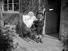Child with a baby in a pram, Hellidon, Northamptonshire, 1900. Artist: A Newton