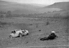 Riley 16 competing in the London Motor Club Coventry Cup Trial, Knatts Hill, Kent, 1938. Artist: Bill Brunell.