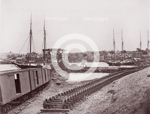 Unloading Supplies for U.S. Military Railroad opposite Richmond, Virginia, ca. 1865. Creator: Unknown.