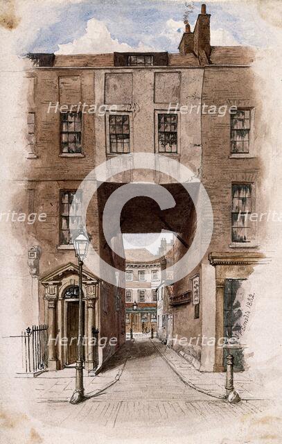 The entrance to Little Ormond Yard, off Great Ormond Street, 1882. Creator: John Phillipps Emslie.