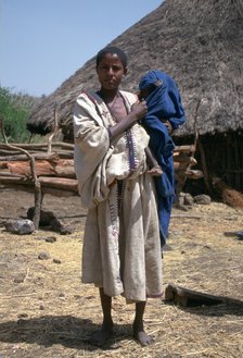 Woman and baby in a village near the Blue Nile Falls, Ethiopia. 