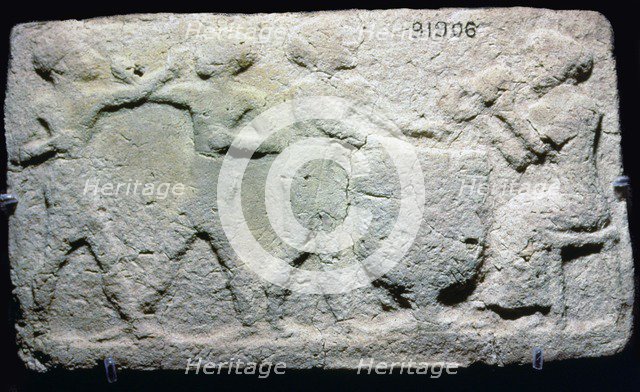 Baked clay plaque of two boxers fighting, while musicians play, from Larsa, Iraq, 2000BC-1750BC. Artist: Unknown