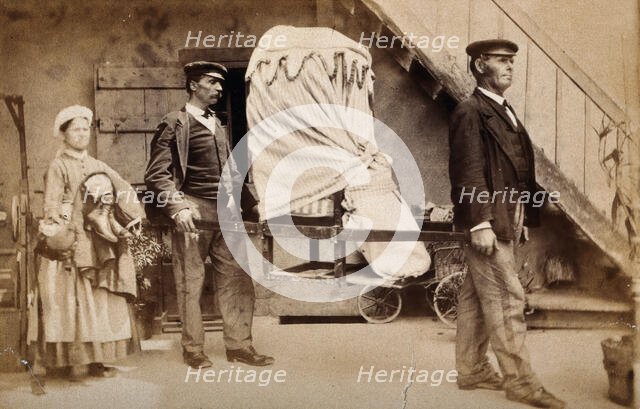 A patient covered by heavy blankets being carried away from the baths at Aix les Bains..., c1890s. Creator: Unknown.