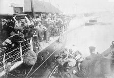 Rimouski -- landing bodies at wharf, 1914. Creator: Bain News Service.