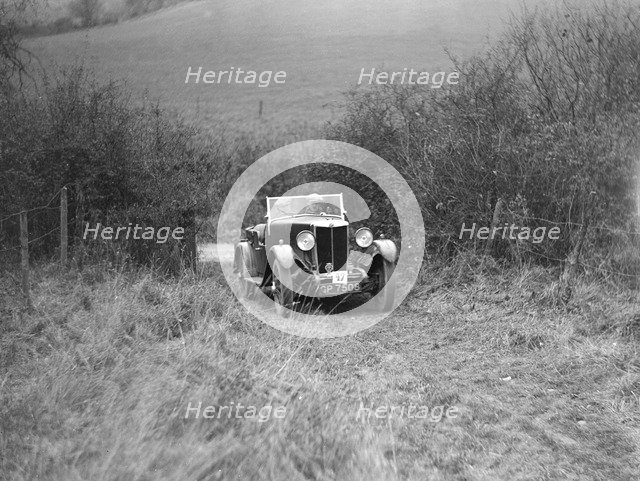 AL Watson's MG 18/80 with sports body competing in the Inter-Varsity Trial, November 1931. Artist: Bill Brunell.