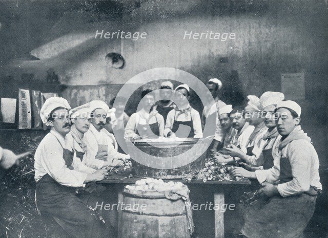 Some of the cooks preparing the soup at the Messagerie Van Gand, c1914. Artist: Unknown