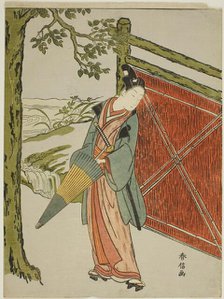 Young Man Holding Umbrella Beside a Fence, c. 1767/68. Creator: Suzuki Harunobu.