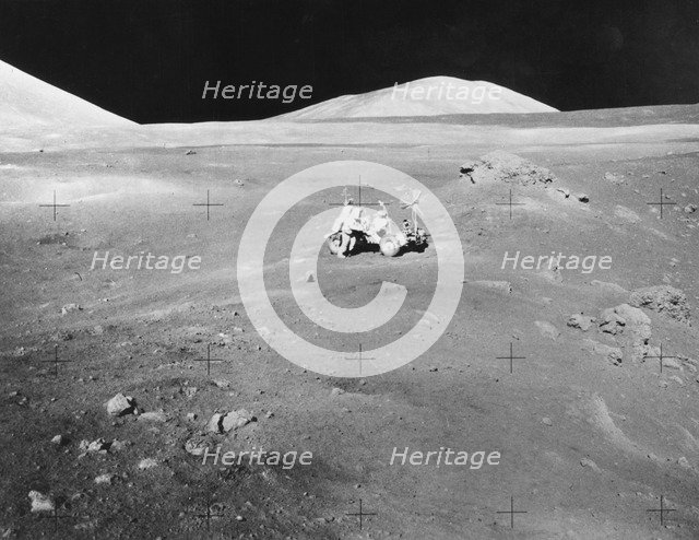Lunarscape of Station 4, showing Harrison Schmitt at the lunar roving vehicle, 1972.  Creator: Unknown.