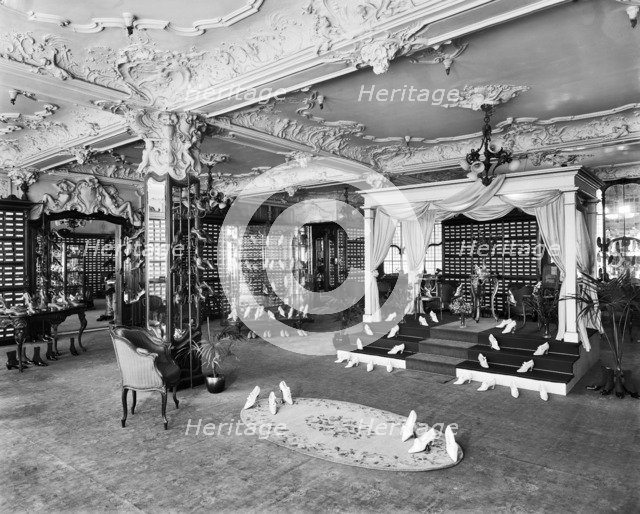 Ladies' shoe department, Harrods, Brompton Road, Knightsbridge, London, 1919. Artist: Adolph Augustus Boucher.