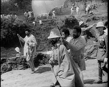 Haile Selassie I, Emperor of Ethiopia Walking with a Crowd, 1930s. Creator: British Pathe Ltd.