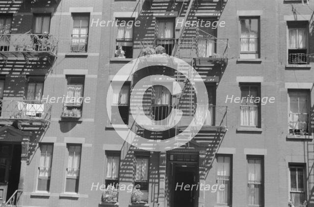 House fronts, 61st Street between 1st and 3rd Avenues, New York, 1938. Creator: Walker Evans.