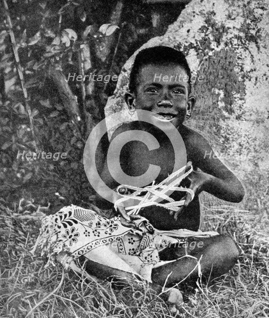 Kiwai child, living at the entrance to the Fly River, New Guinea, 1922. Artist: WN Beaver