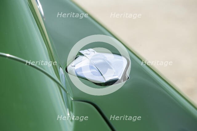 Petrol filler cap of a 1961 Aston Martin DB4 GT previously owned by Donald Campbell. Creator: Unknown.