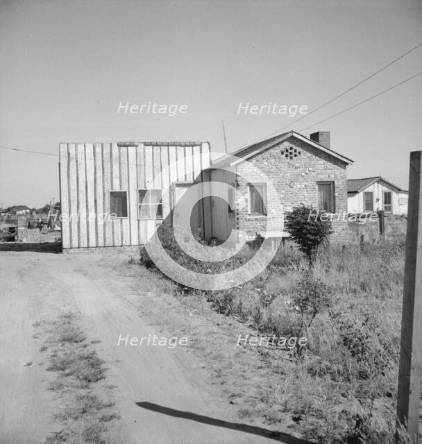 House with about an acre at Highway City, California, 1939. Creator: Dorothea Lange.