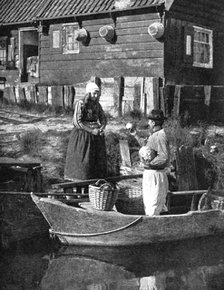 Greengrocer bringing goods by boat, Marken, Holland, 1936. Artist: Donald McLeish