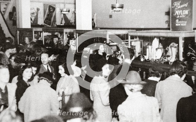 The first experimental sale of nylon stockings, Wilmington, Delaware, USA, 25 October, 1939. Artist: Unknown