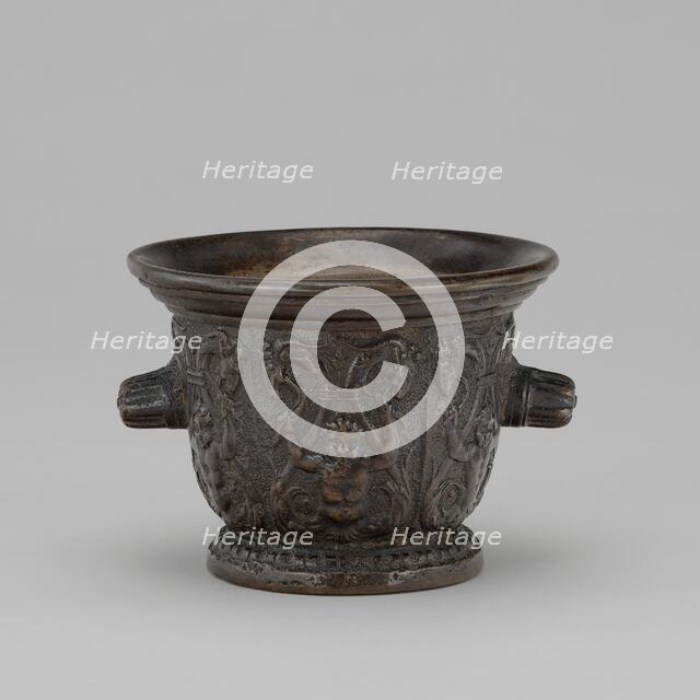 Mortar with Foliate Grotesques, Goats' Heads, and Ribbed Handles, mid 16th century. Creator: Unknown.