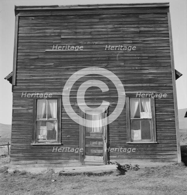 Member of Ola self help sawmill co-op..., "Jacknife Saloon", Gem County, Idaho, 1939. Creator: Dorothea Lange.