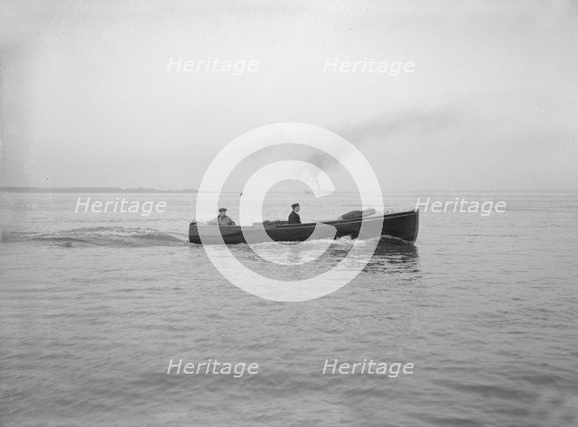 Yacht's motor launch under way, 1914. Creator: Kirk & Sons of Cowes.