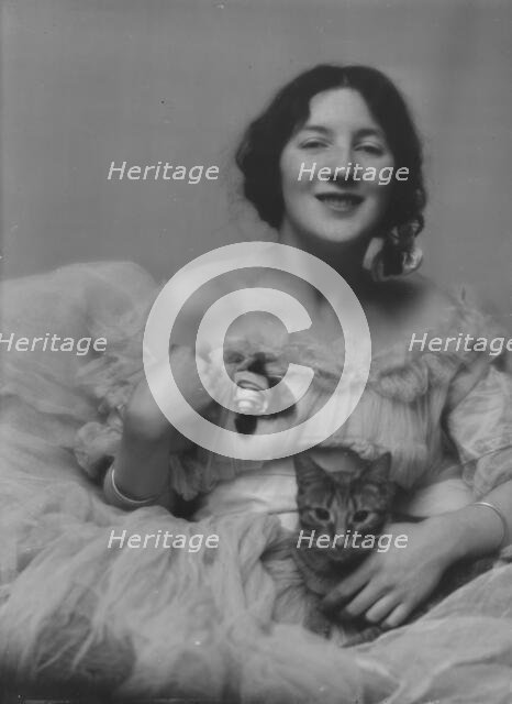 Miss Audrey Munson, with Buzzer the cat, portrait photograph, 1915 Mar. 23. Creator: Arnold Genthe.