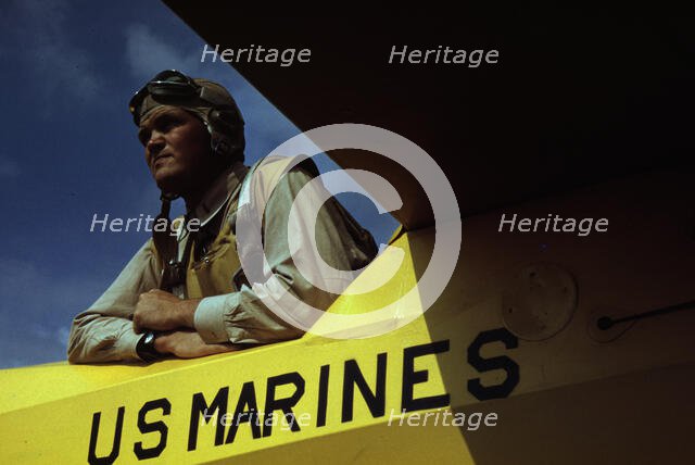 Marine glider pilot in training at Page Field, watching take-offs, Parris Island, S.C., 1942. Creator: Alfred T Palmer.