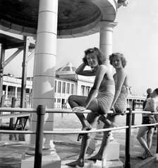 Two bathing beauties pose for the camera in the Blackpool Lido, c1946-c1955. Artist: John Gay