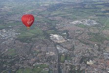 A hot air balloon in flight over York, 2023. Creator: Robyn Andrews.