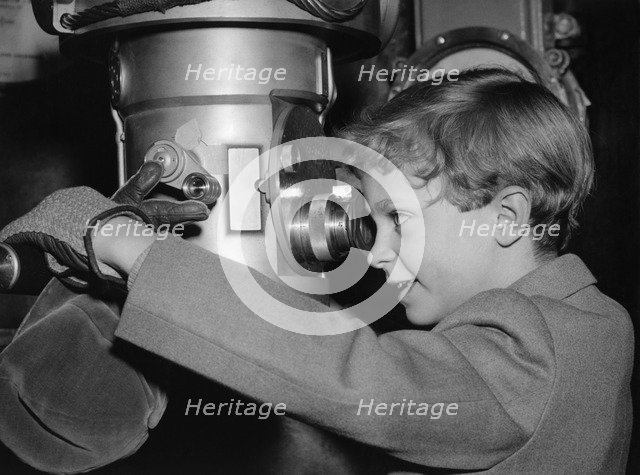 Crown Prince Carl Gustaf of Sweden on a submarine at an exhibition, Stockholm, Sweden, 1956. Artist: Unknown
