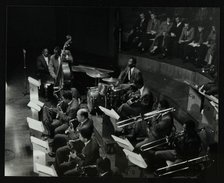 The Count Basie Orchestra in concert at Colston Hall, Bristol, 1957. Artist: Denis Williams
