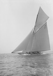 The 15-metre cutter 'Ostara' sailing close-hauled, 1912. Creator: Kirk & Sons of Cowes.