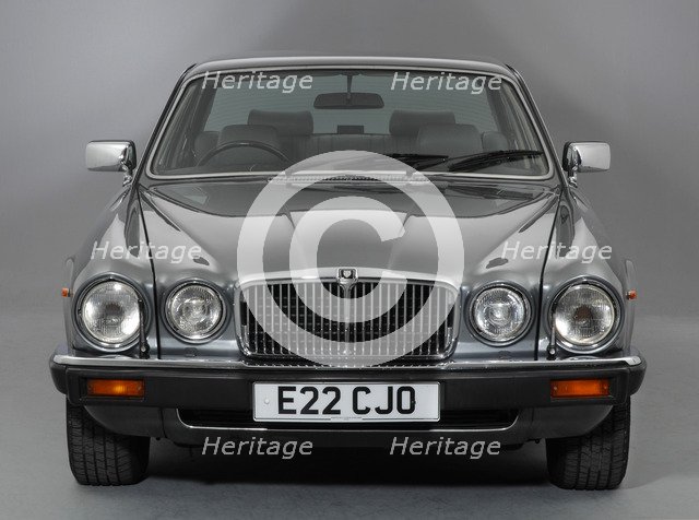 1987 Jaguar XJ12 Sovereign Artist: Unknown.