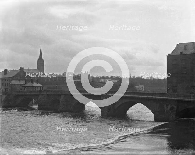 Chester weir and Old Dee Bridge on River Dee with Chester Cathedral in the background, 1902. Creator: Robert Augustus Henry L'Estrange.