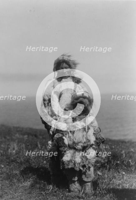 Duck-skin parkas, Nunivak, c1929. Creator: Edward Sheriff Curtis.