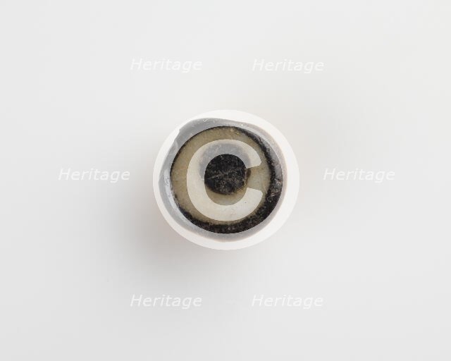 Eye-bead, with an eyelet and also a lateral bore, New Kingdom, 1550-1307 BCE. Creator: Unknown.