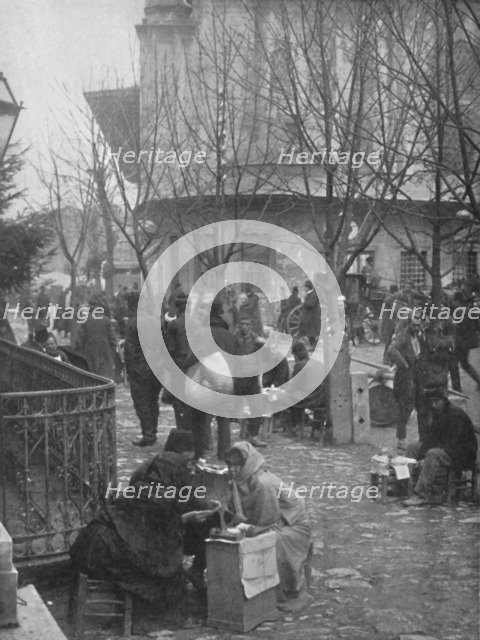 'Public Letter-writers in a Constantinople Street', 1913. Artist: Unknown.