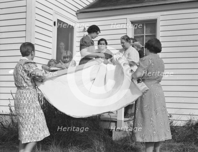 Farm women, members of the "Helping Hand" club..., near West Carlton, Yamhill County, Oregon, 1939. Creator: Dorothea Lange.