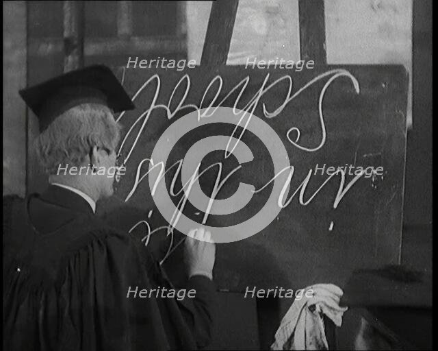 The Entertainer Will Hay...Writing upside down on a Blackboard,1920s Creator: British Pathe Ltd.