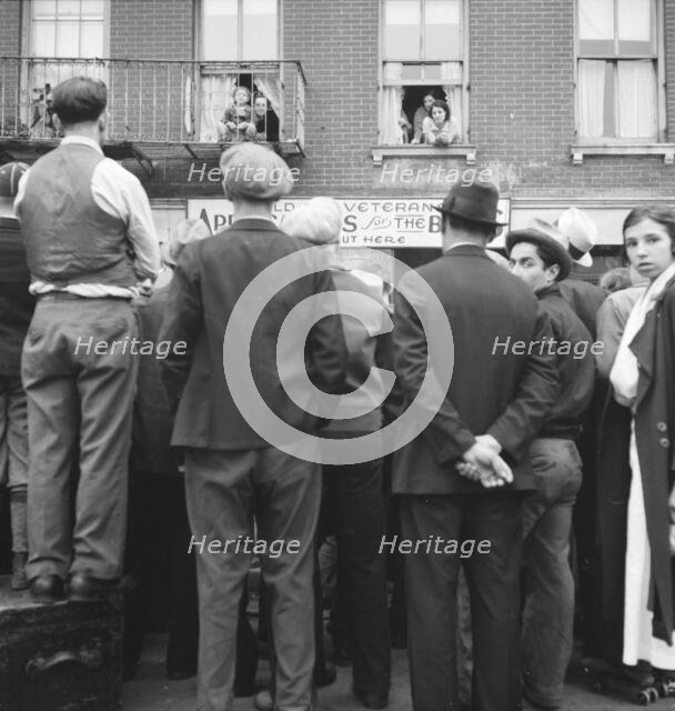 Crowds around post office, Lower East Side, New York, 1936. Creator: Dorothea Lange.