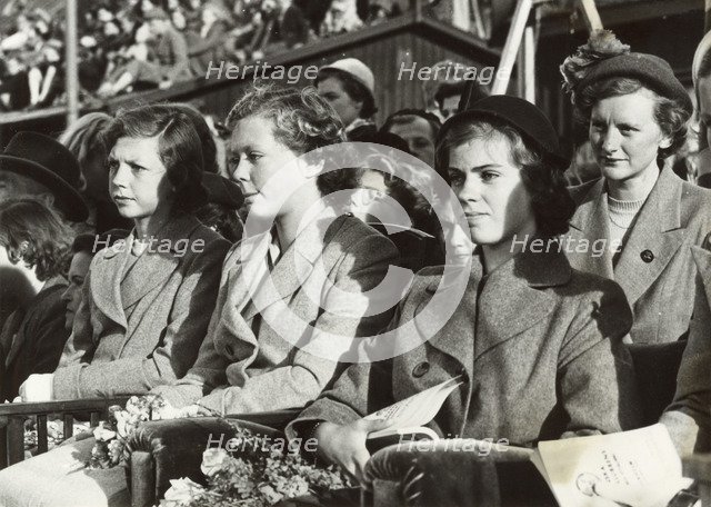 Princesses Desiree, Birgitta and Margaretha of Sweden at a dog show, Stockholm, 1950. Artist: Unknown
